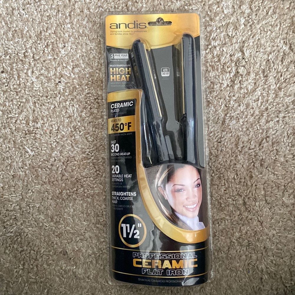Andis ceramic flat iron. Brand new. I have to many flat irons.